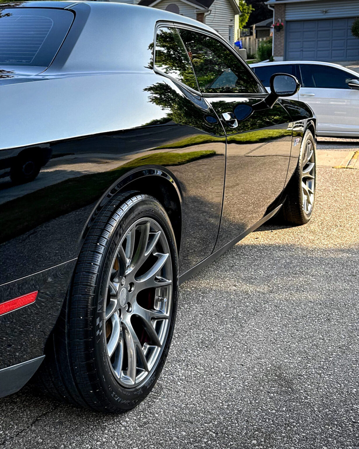 Black 2016 Dodge Challenger Hellcat - Passenger Rear Half after Mobile Detailing and Ceramic Coating