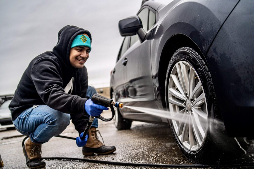 Marco from Diaz Mobile Detailing pressure washing a wheel 2