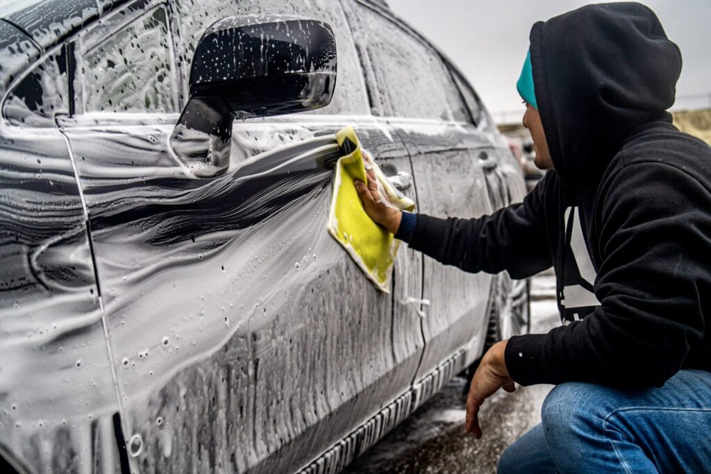 Marco from Diaz Mobile Detailing Washing an SUV with Foam 3