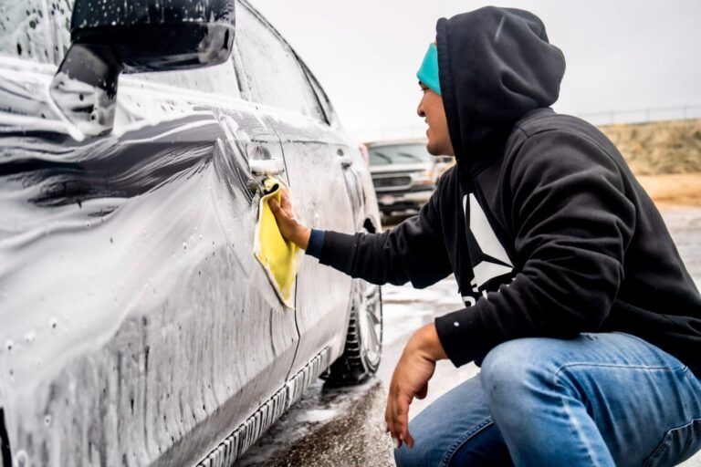 Marco from Diaz Mobile Detailing Washing an SUV with Foam 4