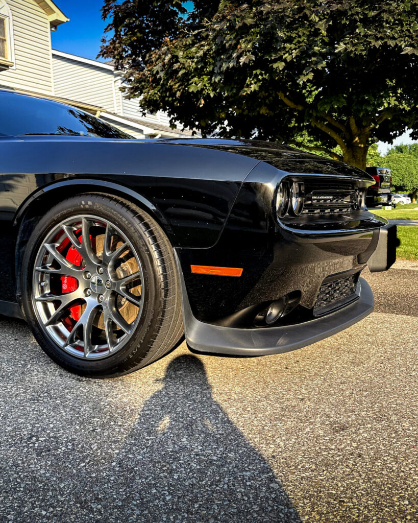 Black 2016 Dodge Challenger Hellcat - Front Passenger Fender Far after Mobile Detailing and Ceramic Coating