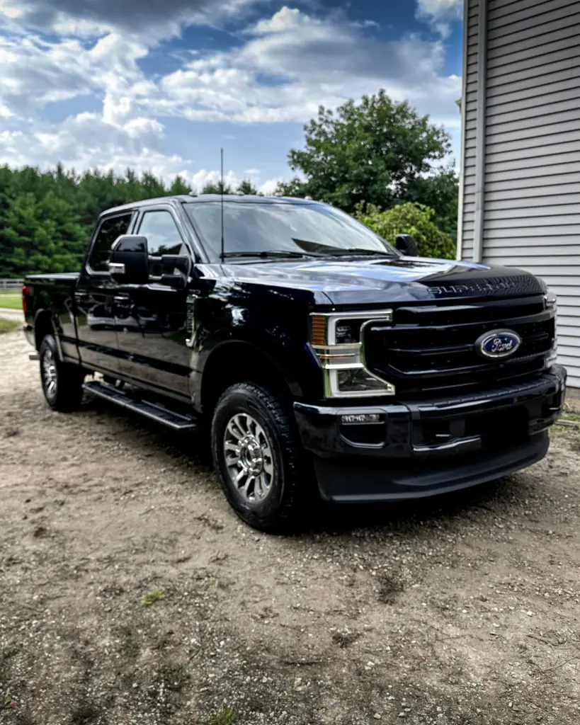 Black 2024 Ford F250 - Passenger Front Half after Mobile Detailing and Ceramic Coating