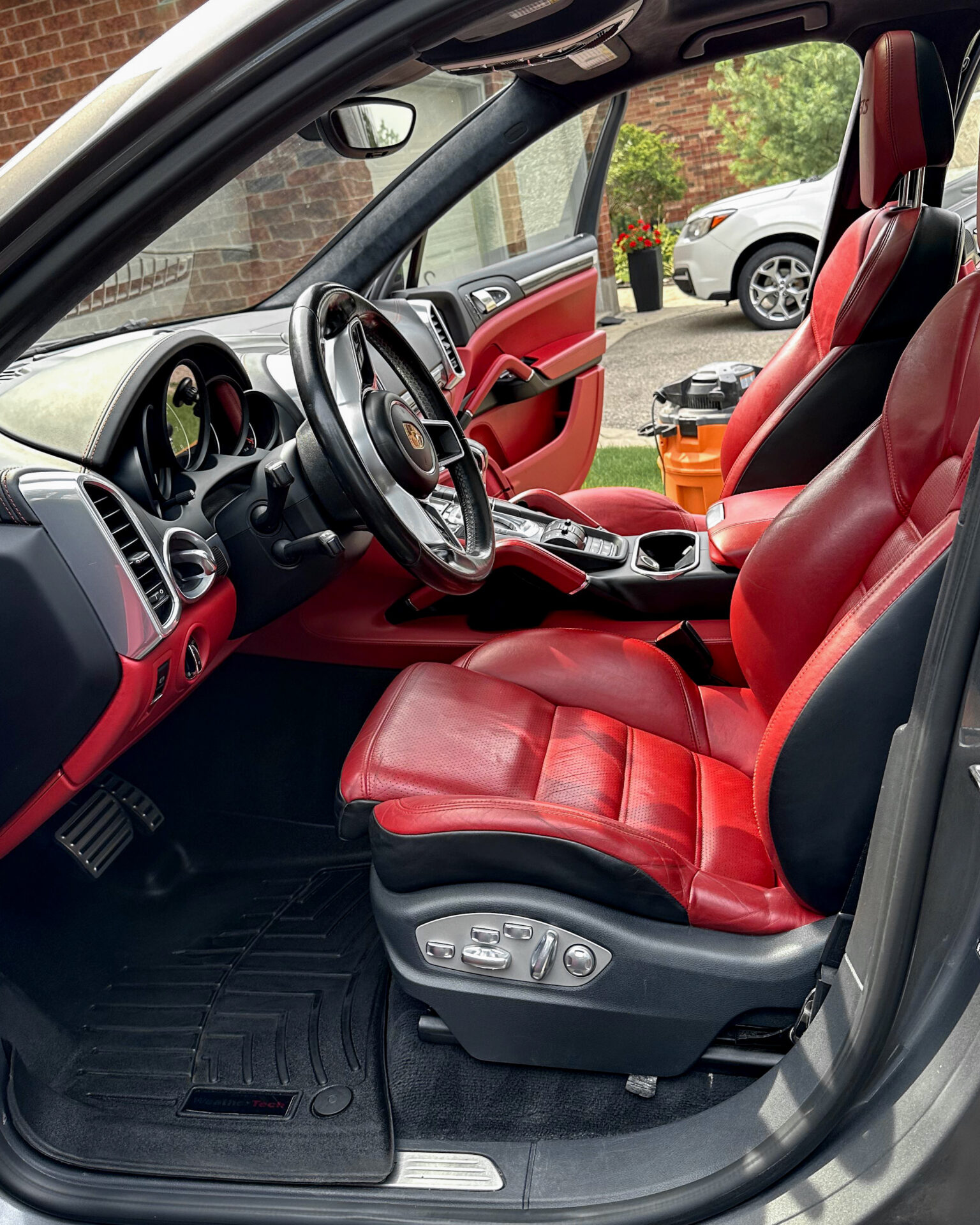 Grey 2020 Porsche Cayenne GTS - AFTER Driver Interior after Mobile Detailing