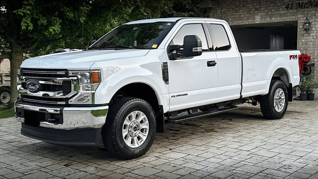 White 2022 Ford F250 - Driver Front Half Far after Mobile Detailing and Ceramic Coating