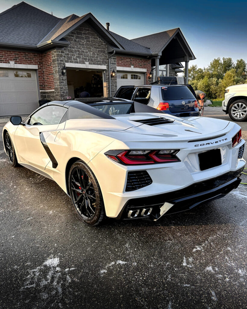 White 2024 Chevy Corvette C8 - Driver Rear Half after Mobile Detailing and Ceramic Coating